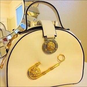 Versace white handbag with gold fixtures